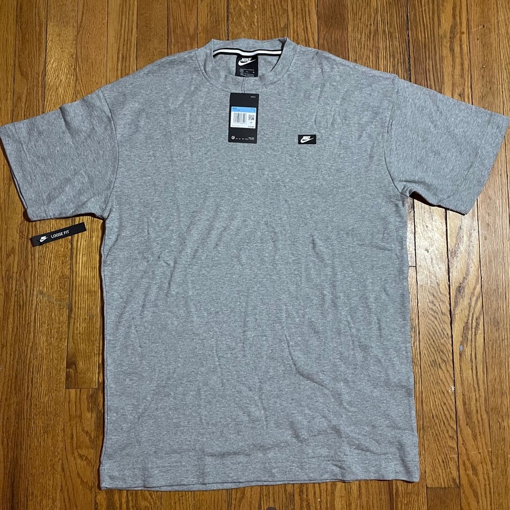 Brand new Nike small box logo tee shirt.